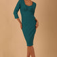Model wearing the Seed in pencil dress design in Harbour green front image