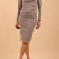 model is wearing diva catwalk cynthia long sleeve pencil dress with low v-neckline in Dove Grey front