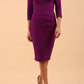 Model wearing the Diva Daphne ¾ Sleeved dress with pleat detail across the hips and ¾ sleeve length in purple magic front image