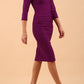 Model wearing the Diva Daphne ¾ Sleeved dress with pleat detail across the hips and ¾ sleeve length in purple magic front image