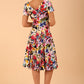 Model wearing a diva catwalk Iris Print Dress short sleeve swing skirt in Fusion Print Colour back