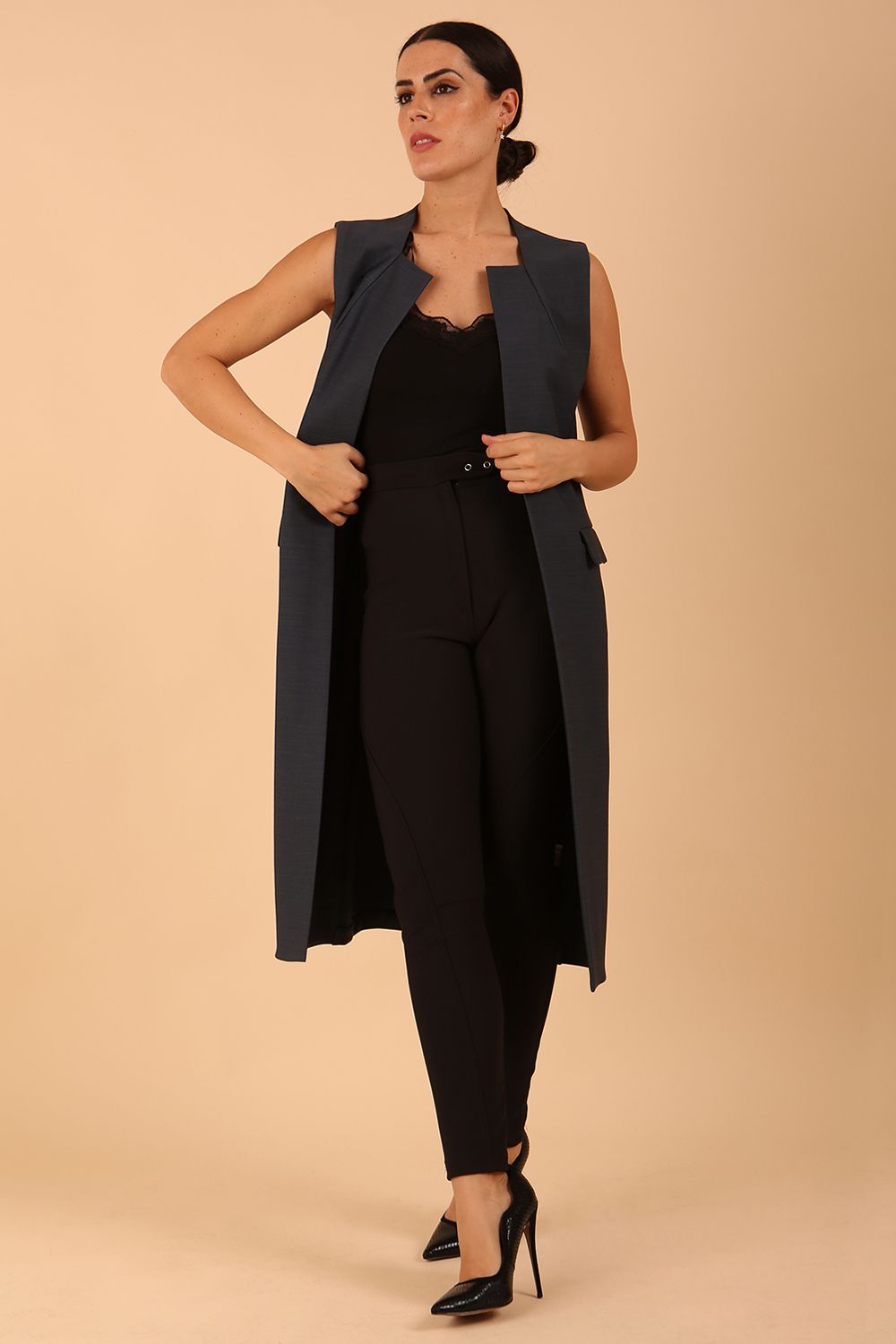 model wearing a divacatwalk Seed Harvard Sleeveless Coat midi length in Slate Grey colour front