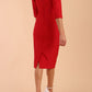 model is wearing diva catwalk seed axford pencil sleeved dress with rounded folded collar in Salsa Red back