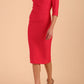 model is wearing diva catwalk seed axford pencil sleeved dress with rounded folded collar in opera pink front