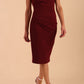 Model wearing Diva Catwalk Polly Rounded Neckline Pencil Cap Sleeve Dress with pleating across the tummy area in Cabaret Burgundy front