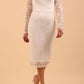 Model wearing a diva catwalk Montana Lace Dress with long lace sleeve and knee length with round lace neckline in Ivory Cream colour front 