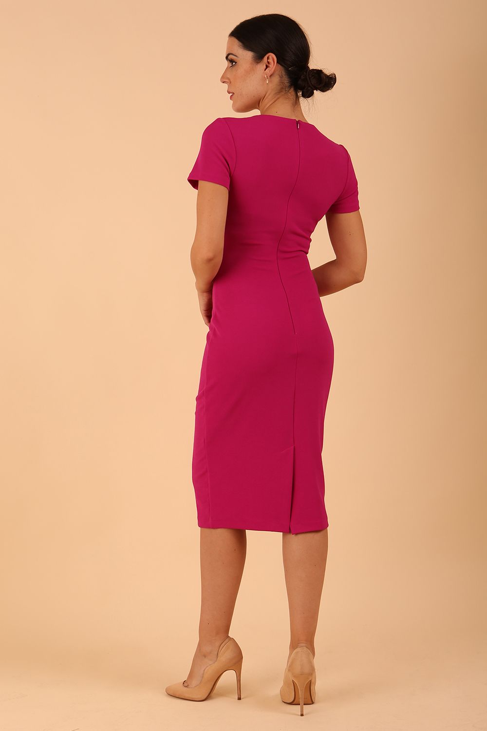 model wearing a diva catwalk Stepford Pencil Dress short sleeves round neckline knee length in magenta colour back