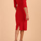 model wearing seed couture royale pencil skirt dress with pleating across the tummy area with rounded neckline with a split in the middle and 3 4 sleeve in Salsa Red colour Back