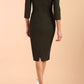 model is wearing diva catwalk polly sleeved pencil dress with low rounded neckline at the back in Buckingham Green back