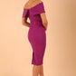 model is wearing diva catwalk mariposa pencil dress with Detailed Bardot neckline with fold-over detail and pleated at waist area in hollyhock purple back