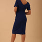 Brunette model is wearing marcel stretch short sleeve pencil dress image in midnight blue colour