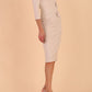Model wearing diva catwalk Seed Andante Pencil Skirt Dress with 3/4 sleeve and bow detail at waistline in Sandy Cream front side