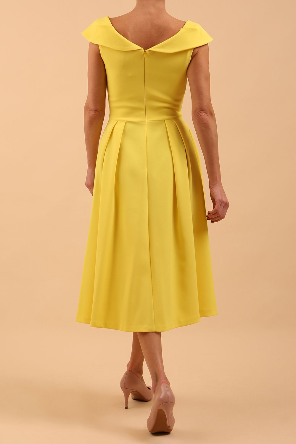 model is wearing divacatwalk Chesterton Sleeveless a-line swing dress in blazing yellow with oversized collar back