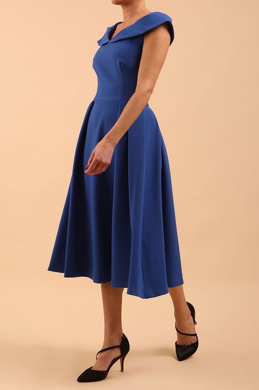 model is wearing divacatwalk Chesterton Sleeveless a-line swing dress in cobalt blue with oversized collar front