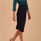 A model is wearing a three quarter sleeve colour block pencil dress by Diva Catwalk in navy and pacific green colour