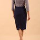 Model wearing Diva catwalk Katykat pencil figure fitted dress in navy blue and steel grey detail with three quarter sleeve back image