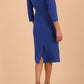 model is wearing diva catwalk chandos sheath dress with three quarter sleeve and slit in the middle of the neckline in cobalt blue back