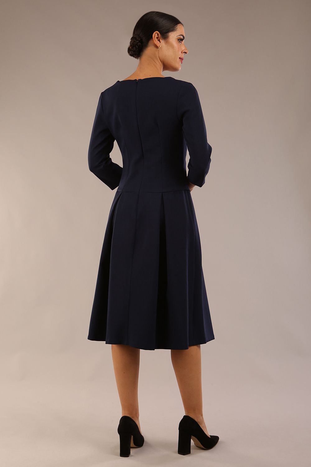 model is wearing a diva catwalk Cordelia Square Neck Pleated Midi A-line Dress with 3/4 sleeve in navy blue colour back (Navy Blue)