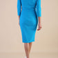 Model wearing diva catwalk Trixie dress in Turquoise Blue back