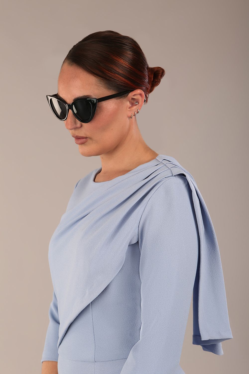 model wearing a diva catwalk Frieth Gathered Shoulder Dress 3/4 sleeves knee length with shoulder detail in powder blue colour (Powder Blue)