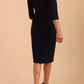Model wearing DIVA Catwalk Peppard 3/4 Sleeve Pencil Dress in Cameo fabric knee length in navy blue colour back image