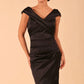 model is wearing diva catwalk casa blanca satin black pencil dress off shoulder design close up