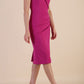 brunette model wearing diva catwalk evening pencil skirt dress sleeveless with lowered neckline and pleating on side in magenta colour front