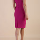 model wearing diva catwalk daphne sleeveless magenta haze pencil dress with rounded neckline with split in the middle in front