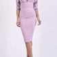Model wearing the Diva Cynthia Print Contrast dress with pleating across the front in dawn pink fern front image