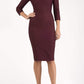 model is wearing seed rowena pencil dress with sleeves and square neckline in port royale front