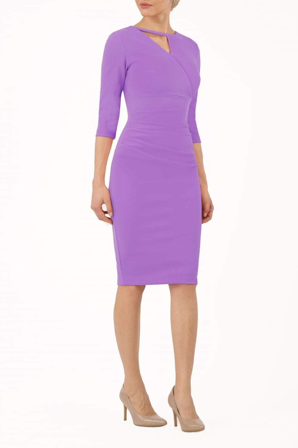 model wearing diva catwalk helston lilac pencil skirt  dress with sleeves and cut out detail on the neckline front