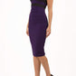 Model wearing the Diva Banbury Colour block dress with bust panels in contrast and pleating across the front in black and violet front image