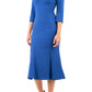 blonde model is wearing diva catwalk senne midaxi sleeved dress with fishtail and rounded neckline with a slit in the middle in royal blue front