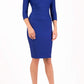 model wearing diva catwalk york pencil-skirt dress with sleeves and rounded folded collar and plearing across the tummy area in cobalt blue colour front