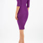 Model wearing the Diva Carlotta Pencil dress with pleat detail at the neckline and across the front in violet purple front image