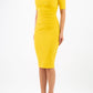 blonde model is wearing diva catwalk lydia short sleeve pencil fitted dress in mustard yellow colour with rounded neckline with a slit in the middle front