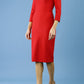 model is wearing seed rowena pencil dress with sleeves and square neckline in salsa red front