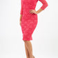 Model wearing Diva Bucklebury Lace pencil dress with sleeves in ripple crepe and stretch lace fabric in coral lace front