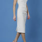 model is wearing diva catwalk seed fitzrovia sleeveless pencil dress in sandy cream front