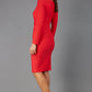 brunette model wearing diva catwalk pencil skirt dress sleeved with  pleating on side in electric red colour back