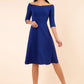 brunette model is wearing diva catwalk off shulder swing a-line islay dress with sleeves in oxford blue front