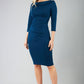 model wearing diva catwalk york pencil-skirt dress with sleeves and rounded folded collar and plearing across the tummy area in glorious teal colour front