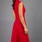 Brunette Model is wearing a sleeveless swing high neck dress with high neck in red by Diva Catwalk back