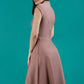 Brunette Model is wearing a sleeveless swing high neck dress with high neck in acorn brown by Diva Catwalk back