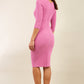 model wearing diva catwalk helston begonia pink pencil skirt dress with sleeves and cut out detail on the neckline back