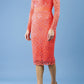 Model wearing the Diva Cherrie Lace Pencil dress with long sleeves and round neck in hot coral front