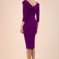 model is wearing diva catwalk eliza sleeved pencil dress with collared v-neck in purple back