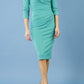 model is wearing diva catwalk eliza sleeved pencil dress with collared v-neck in emerald Green front