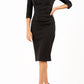 model wearing diva catwalk black pencil-skirt dress  with 3 4 sleeves and pleated pencil skirt and oversized collar front