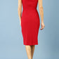 Model wearing Diva Clara Pencil dress with vertical pleat detailing at bust sleeveless design in scarlet red back